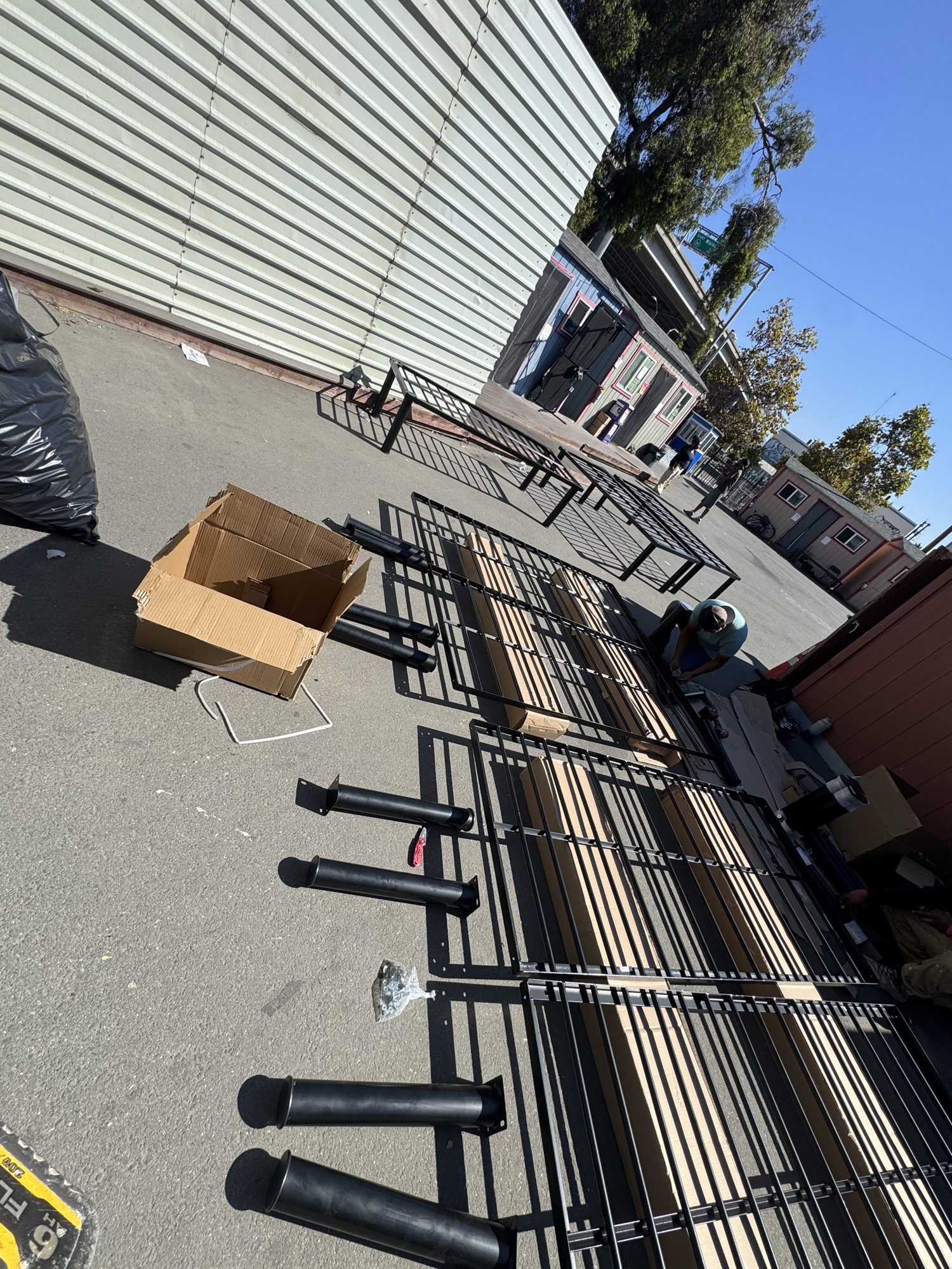 Bed frames and legs staged for assembly